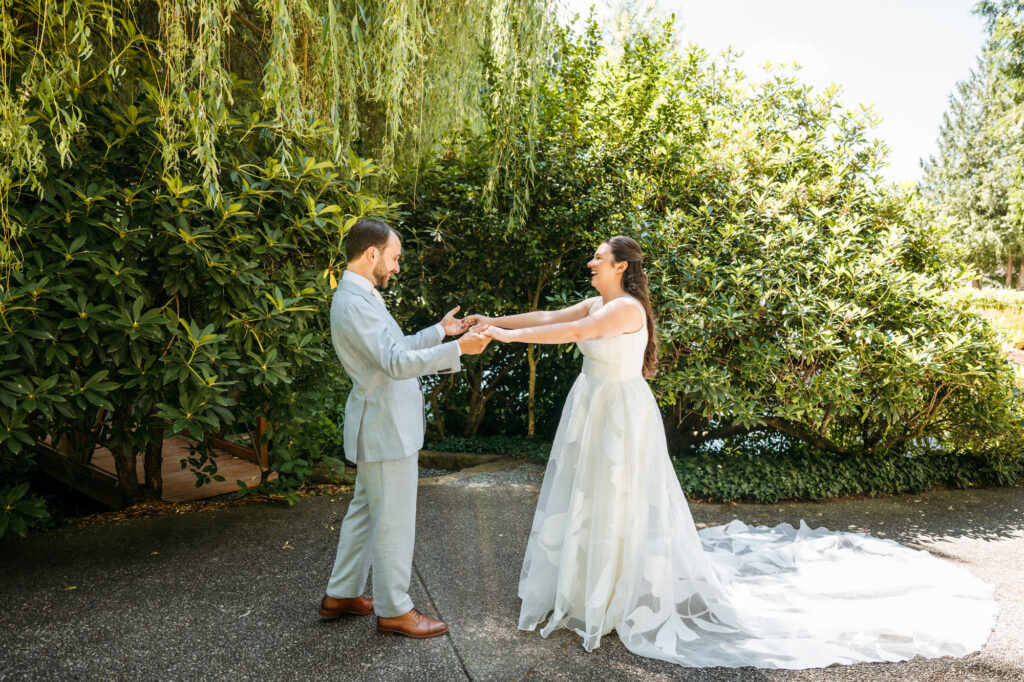 Bride and groom share first look on their wedding day at Chateau Lill.